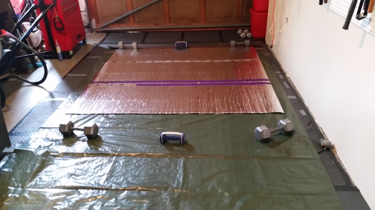 Cut the tarp to have at least 3 inches all the way around to fold over. Glue down the insulation.
